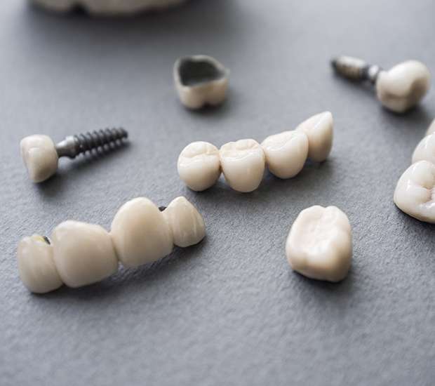Flushing The Difference Between Dental Implants and Mini Dental Implants
