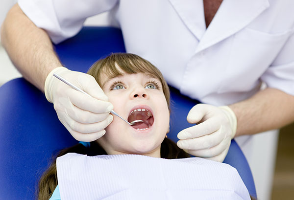 A Kid Friendly Dentist Answers FAQs About Baby Teeth